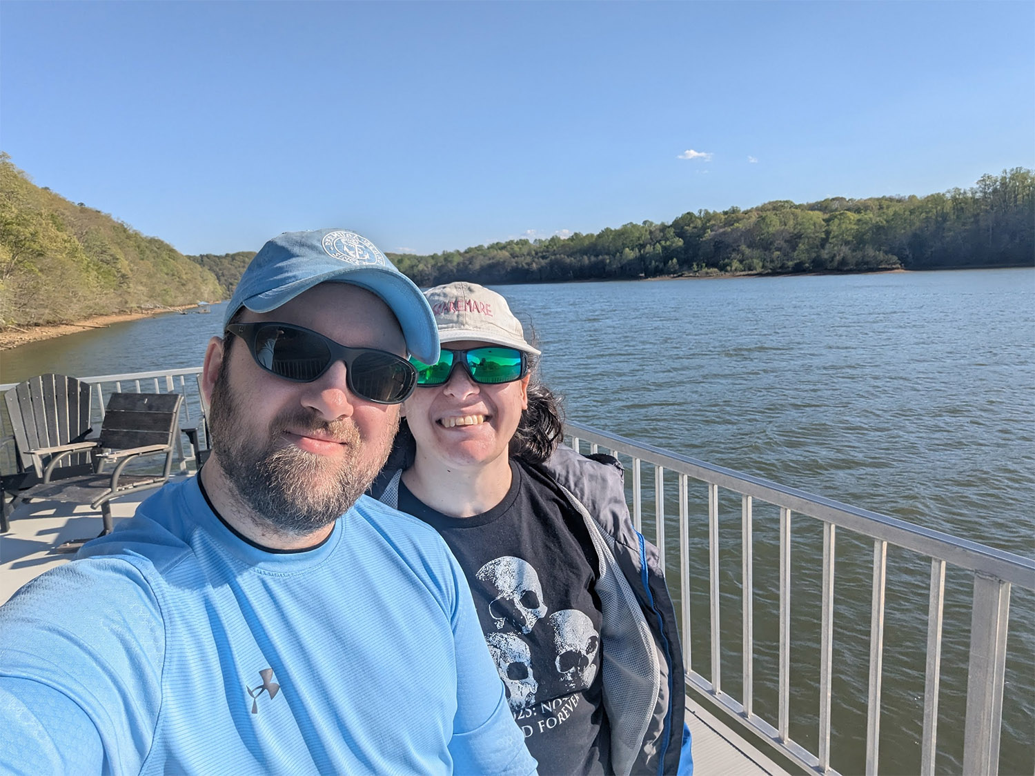Eli and Sarah on the water, smiling